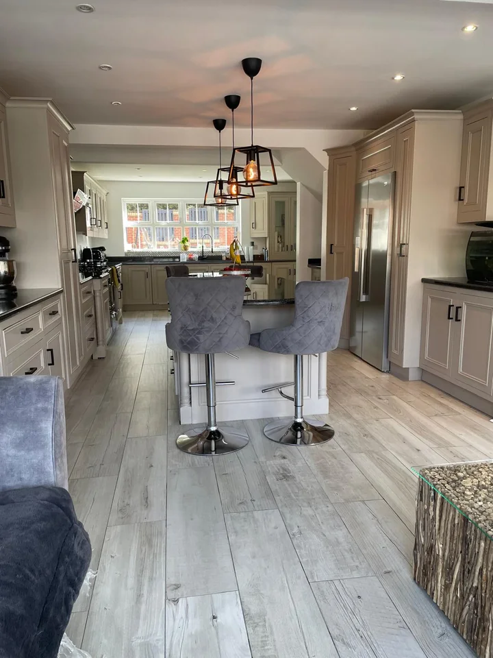 Shaker kitchen with island and pendant lights