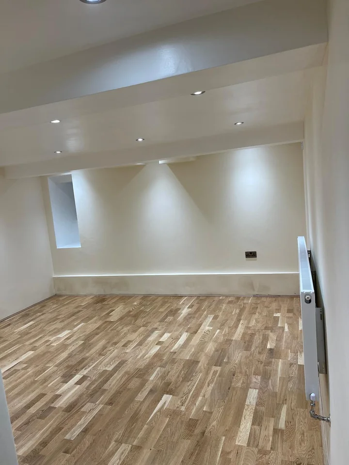 Refurbished room with fresh plaster and oak floor